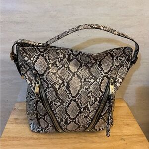 Jessica Simpson snakeskin-print hobo satchel.